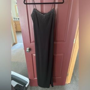 Long black cocktail dress with waterfall beads on back